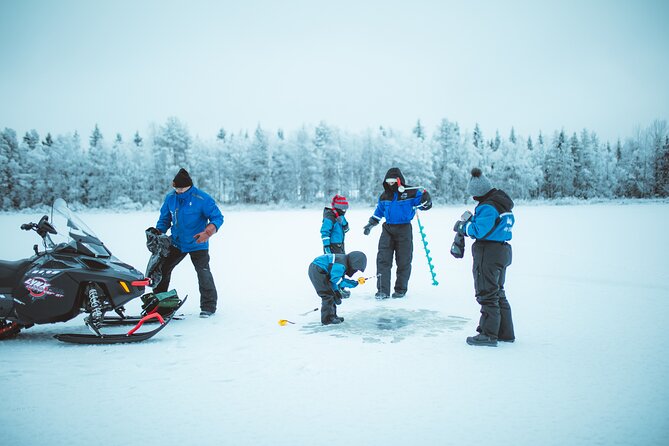 Snowmobiling and ice fishing in Apukka Resort, Rovaniemi - Bonfire warmth, coffee, tea, and a snack