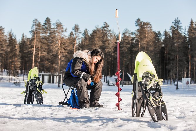Snowshoeing and Ice Fishing Tour - The fire, sausages, and Finnish snacks