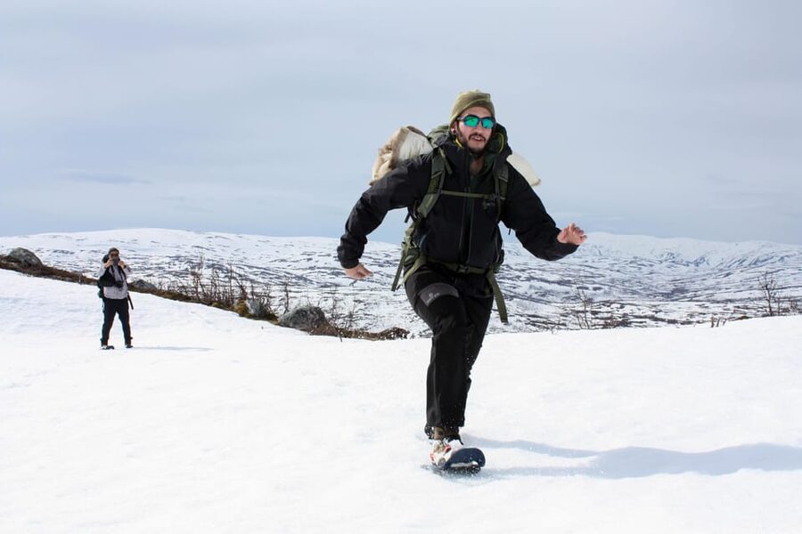 Tromsø: Ice Fishing and Snowshoe Hiking with a Local Guide - Four hours by the fire