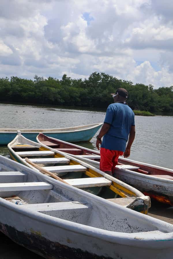Typical lunch on beach, mangrove tour & fishing with natives - Learning to throw a net and set crab pots