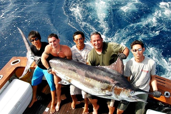 Ultimate Full-Day Big Game Fishing & Trolling Tour - Thai buffet lunch on a busy anchorage
