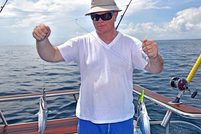 Ultimate Full-Day Big Game Fishing & Trolling Tour - Snorkeling and swimming near the island