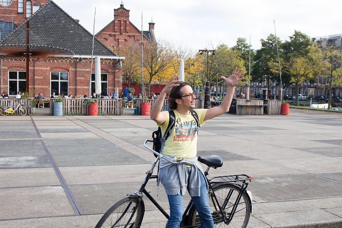 Urban Adventures Amsterdam Bike Tour, Graffiti and Magnet Fishing - NDSM is the big street art payoff