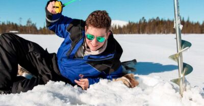 Ylläs: Snowmobile Adventure with Ice Fishing